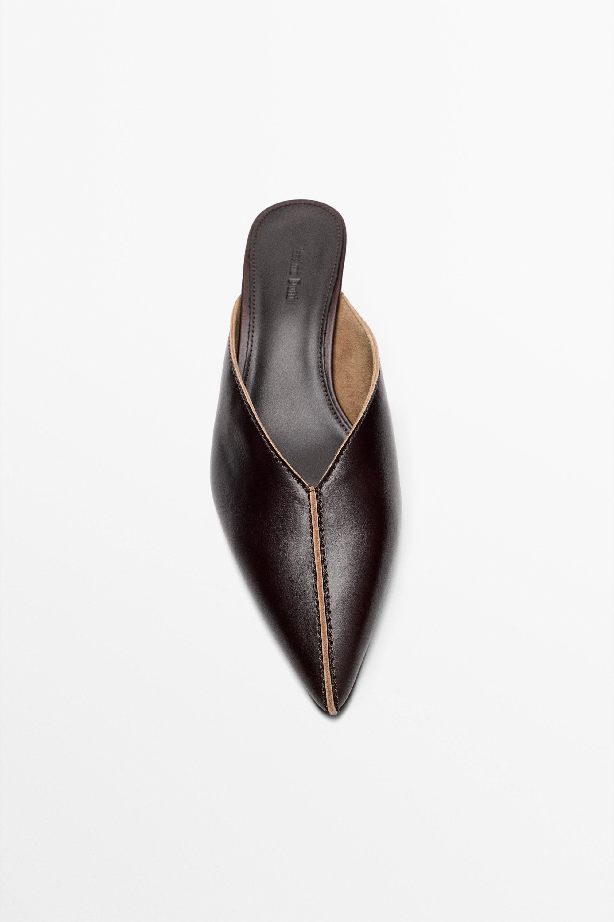 Heeled mule shoe